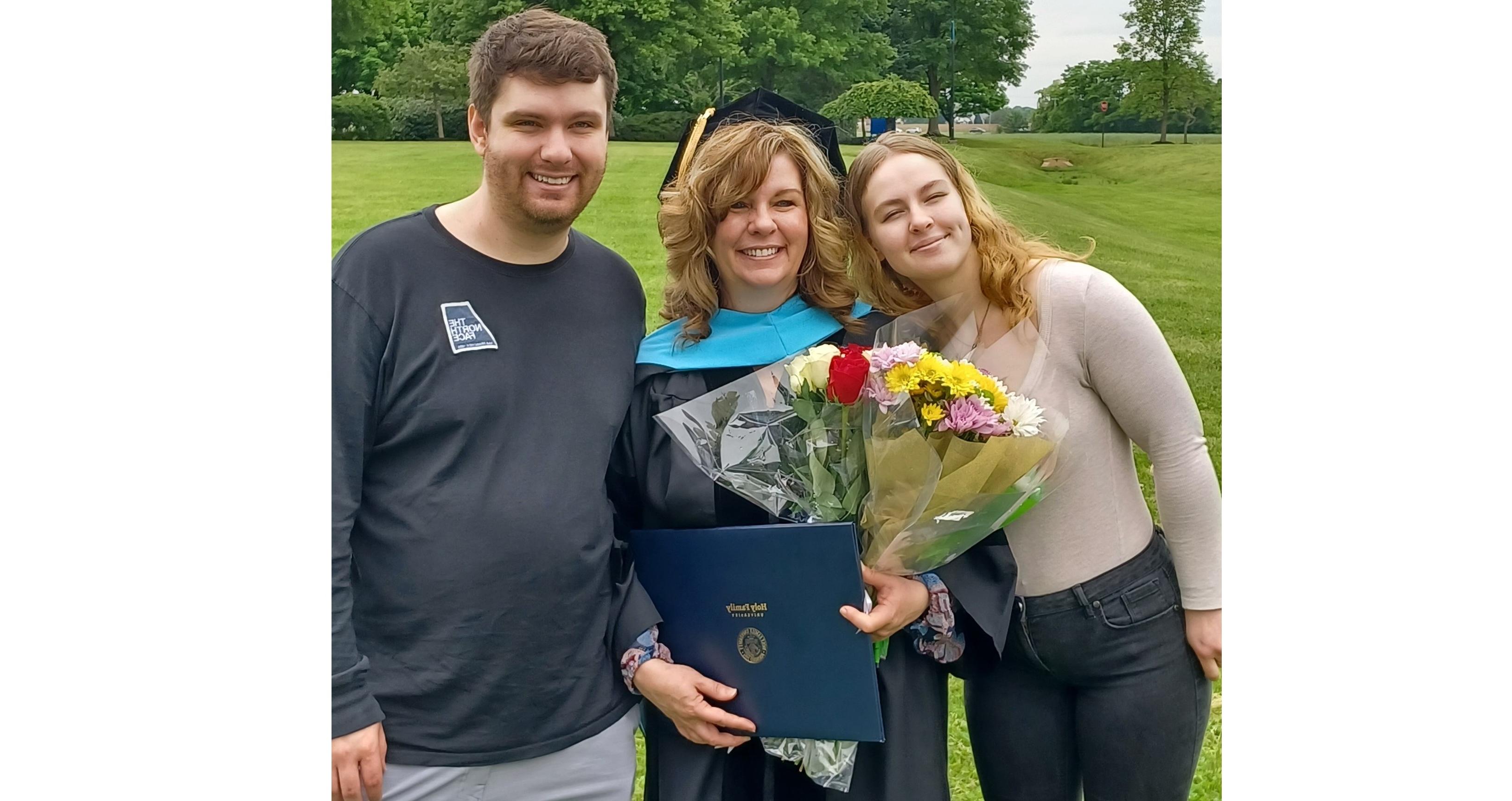 Angela Ashley Graduation Picture w/ Family